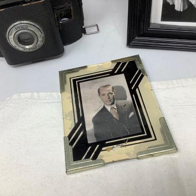 Sale Photo Thumbnail #67: You get a vintage Ansco camera, Lady dance picture, young man vintage picture, and Gold wall hanging decoration.