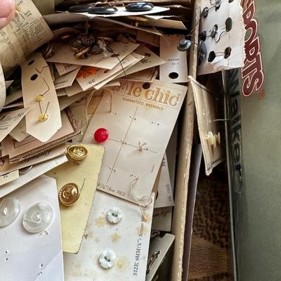 A HUGE ASSORTMENT OF OLD BUTTONS