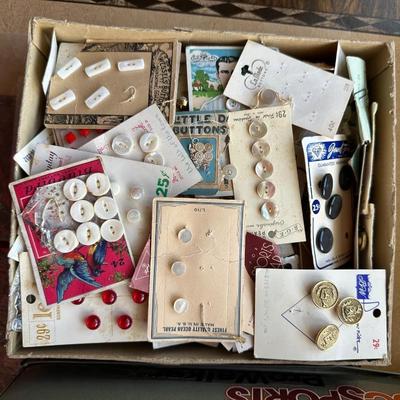 A HUGE ASSORTMENT OF OLD BUTTONS
