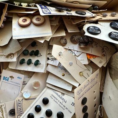 A HUGE ASSORTMENT OF OLD BUTTONS