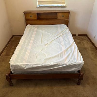 QUEEN SIZE BED WITH A SLIDING BOOKSHELF HEADBOARD