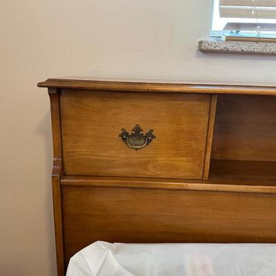 QUEEN SIZE BED WITH A SLIDING BOOKSHELF HEADBOARD