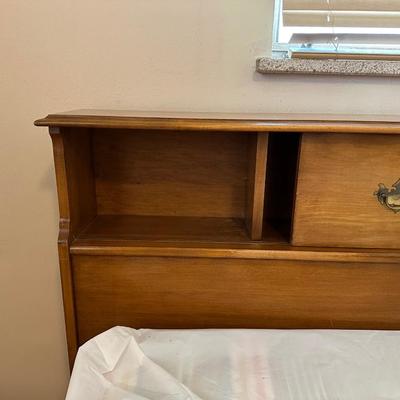 QUEEN SIZE BED WITH A SLIDING BOOKSHELF HEADBOARD