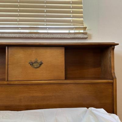 QUEEN SIZE BED WITH A SLIDING BOOKSHELF HEADBOARD