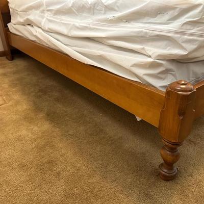 QUEEN SIZE BED WITH A SLIDING BOOKSHELF HEADBOARD