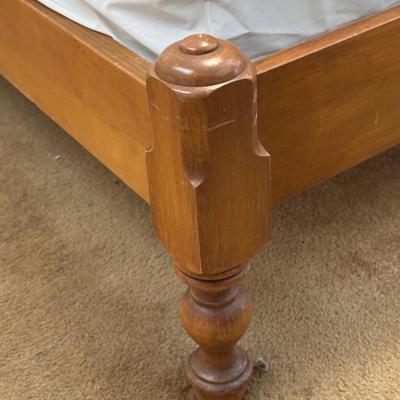 QUEEN SIZE BED WITH A SLIDING BOOKSHELF HEADBOARD