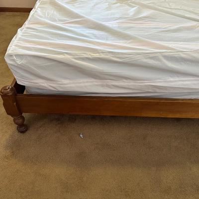 QUEEN SIZE BED WITH A SLIDING BOOKSHELF HEADBOARD