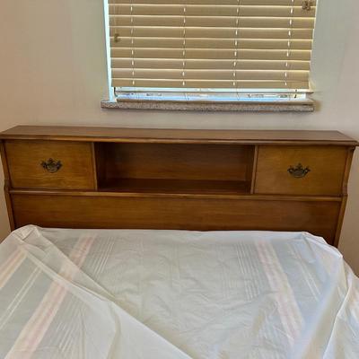 QUEEN SIZE BED WITH A SLIDING BOOKSHELF HEADBOARD