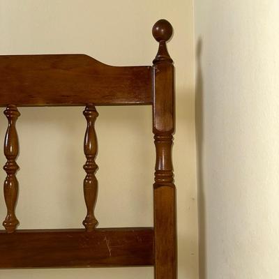 TWIN BED BOX SPRING WITH HEADBOARD AND METAL FRAME ON CASTERS