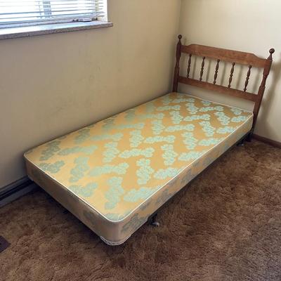 TWIN BED BOX SPRING WITH HEADBOARD AND METAL FRAME ON CASTERS