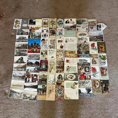 AN ASSORTMENT OF VINTAGE POSTCARDS