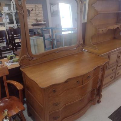 Antique Solid Oak Serpentine Two Over Two Dresser with Harnessed Swivel Mirror