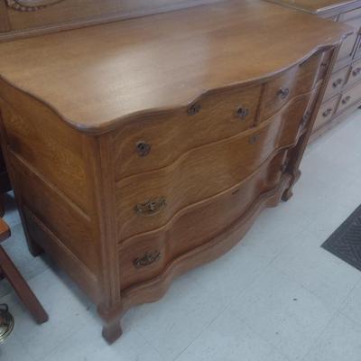 Antique Solid Oak Serpentine Two Over Two Dresser with Harnessed Swivel Mirror