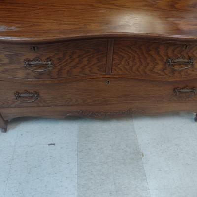 Antique Solid Oak Serpentine Two Over One Dresser with Harnessed Swivel Mirror