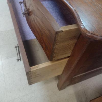Antique Solid Oak Serpentine Two Over One Dresser with Harnessed Swivel Mirror