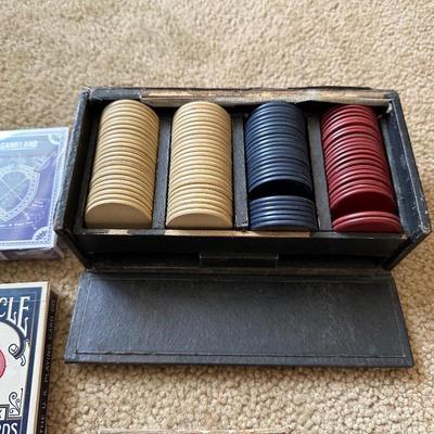 POKER CHIPS, DECKS OF CARDS AND A CARD SHUFFLER