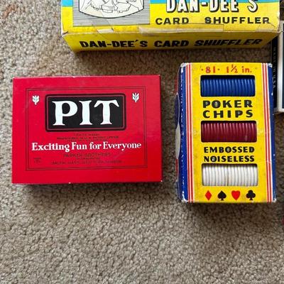 POKER CHIPS, DECKS OF CARDS AND A CARD SHUFFLER