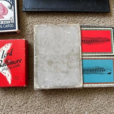 POKER CHIPS, DECKS OF CARDS AND A CARD SHUFFLER