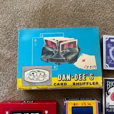 POKER CHIPS, DECKS OF CARDS AND A CARD SHUFFLER