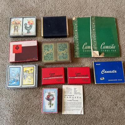 DECKS OF CARDS AND CANASTA SCORE SHEETS