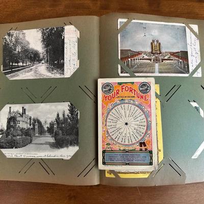 A POSTCARD BOOK FULL OF OLD POSTCARDS
