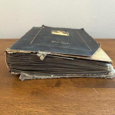 ANTIQUE POSTCARDS IN AN ANTIQUE BOOK