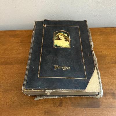 ANTIQUE POSTCARDS IN AN ANTIQUE BOOK