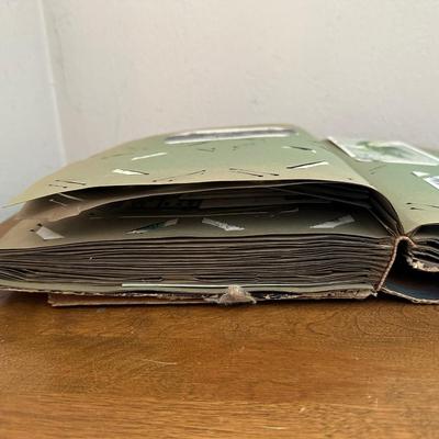 ANTIQUE POSTCARDS IN AN ANTIQUE BOOK