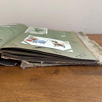 ANTIQUE POSTCARDS IN AN ANTIQUE BOOK