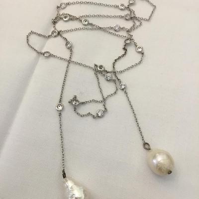 Beautiful, silver toned, crystal caged, necklace, and mother of pearl