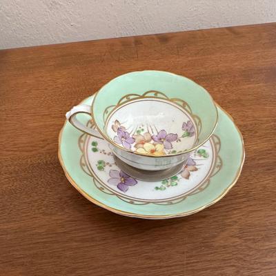 IRONSTONE WASH BOWL AND PITCHER WITH BONE CHINA TEA CUP AND SAUCER