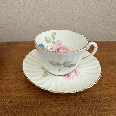 IRONSTONE WASH BOWL AND PITCHER WITH BONE CHINA TEA CUP AND SAUCER