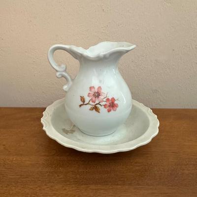 IRONSTONE WASH BOWL AND PITCHER WITH BONE CHINA TEA CUP AND SAUCER