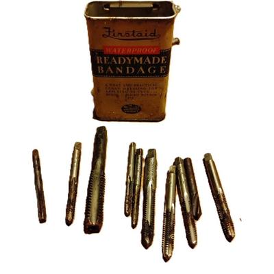 Greenfield threading bits in a vintage bandage tin