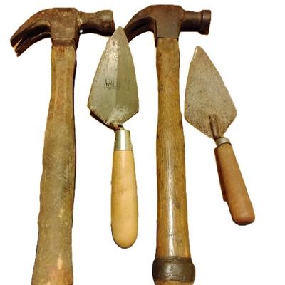 Hammers, trowel, and a crowbar