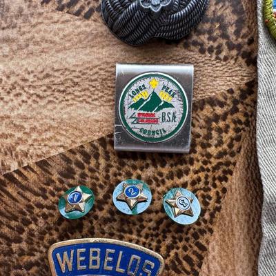 VINTAGE BOY SCOUTS SASH WITH MERIT BADGES, NECKERCHIEF HOLDERS AND WEBELOS TRICOLOR RIBBON WITH PINS