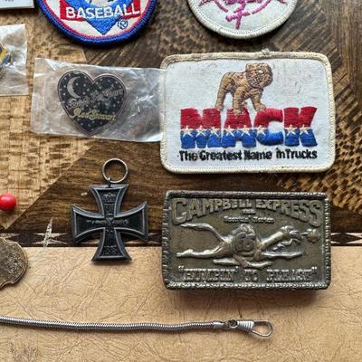 NICE ASSORTMENT OF PATCHES, PINS, VINTAGE MAGNIFYING GLASS LOUPE, METAL COINS AND MORE