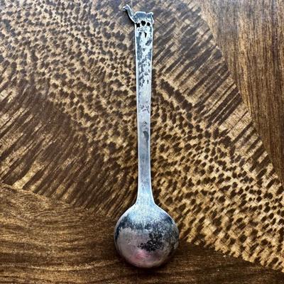 WALKING CANE HANDLE WITH STERLING SILVER TIP, GLASS PAPERWEIGHT AWARD WITH STERLING SILVER RIBBON AND COLLECTORS SPOON