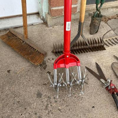 MISCELLANEOUS YARD TOOLS AND A PUSH BROOM