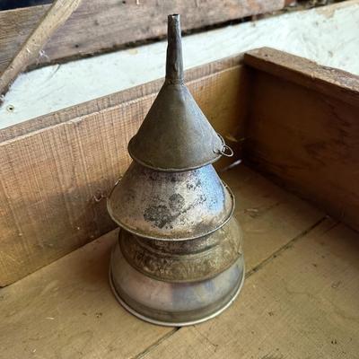 SPARE WHEELS, FUNNELS, VINTAGE TAPE MEASURE, VINTAGE FLASHLIGHT AND VINTAGE EAGLE OIL CAN