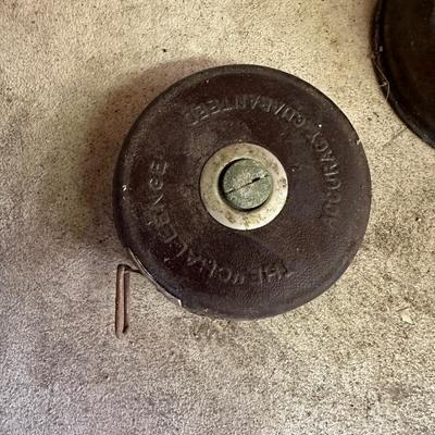 SPARE WHEELS, FUNNELS, VINTAGE TAPE MEASURE, VINTAGE FLASHLIGHT AND VINTAGE EAGLE OIL CAN