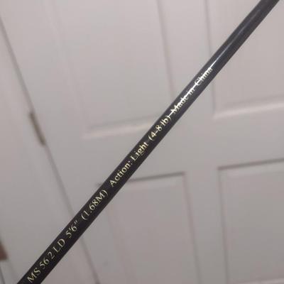 Pair of Shakespeare Fishing Poles with One Shakespeare Reel