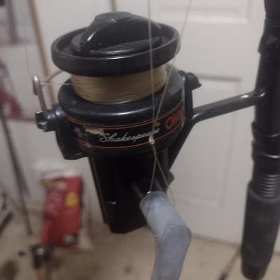 Pair of Shakespeare Fishing Poles with One Shakespeare Reel