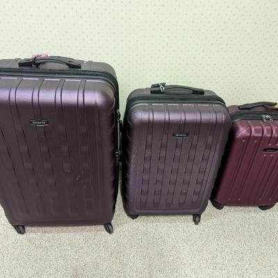 Samsonite Hard Shell Rolling Suit Cases