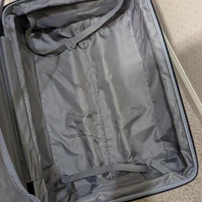 Samsonite Hard Shell Rolling Suit Cases