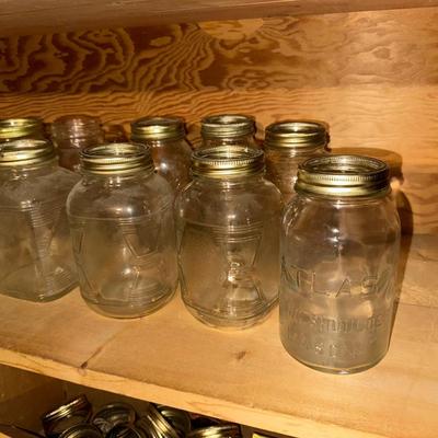 CANNING JARS AND A BOX OF KERR MASON CAPS
