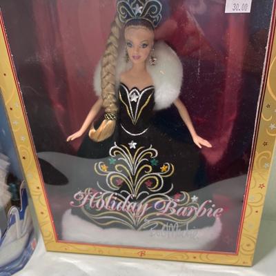Swan lake, holiday, and army Barbie