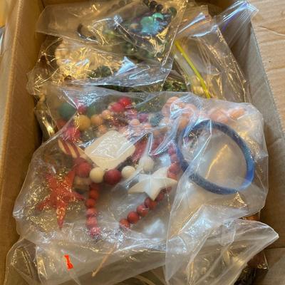 Box full of beaded necklaces