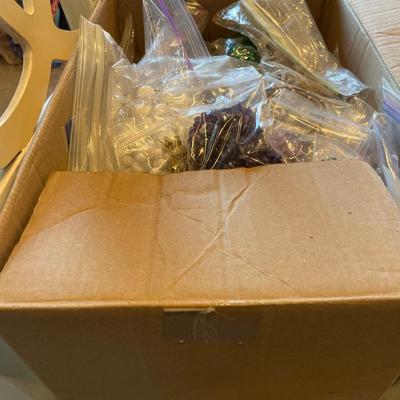 Box full of beaded necklaces