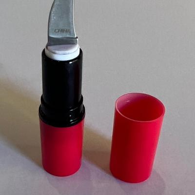 Lipstick case pocket knife prop